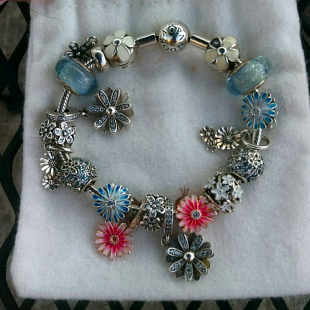 READ.. New and used pandora charms SELLING altogether now. No spacers